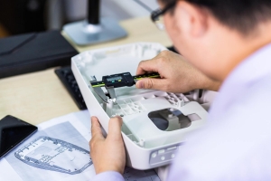 Man checking the device parts