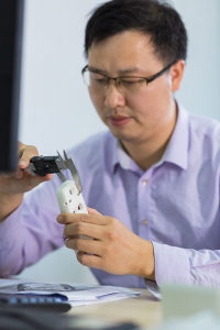 Man checking the device parts