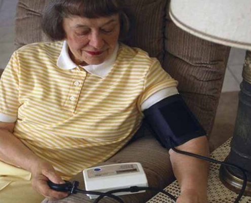 A Person Checking their Blood Pressure at Home