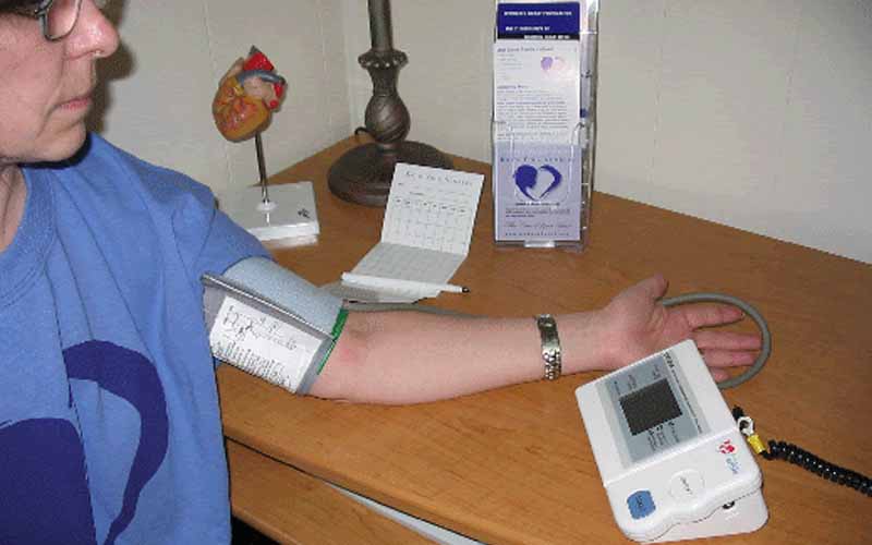Patient-taking-blood-pressure-readings-on-his-arm