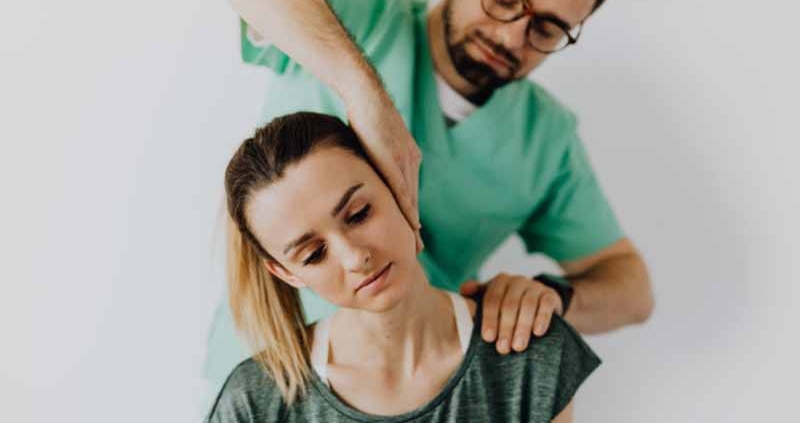 a lady receiving pain-relief massage