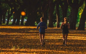 Two women running in the park