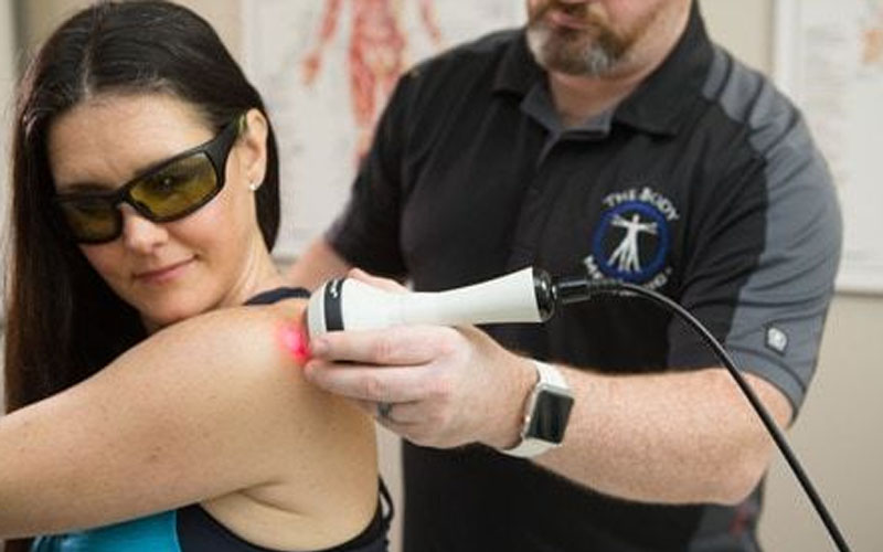 Laser treatment for shoulder blade pain